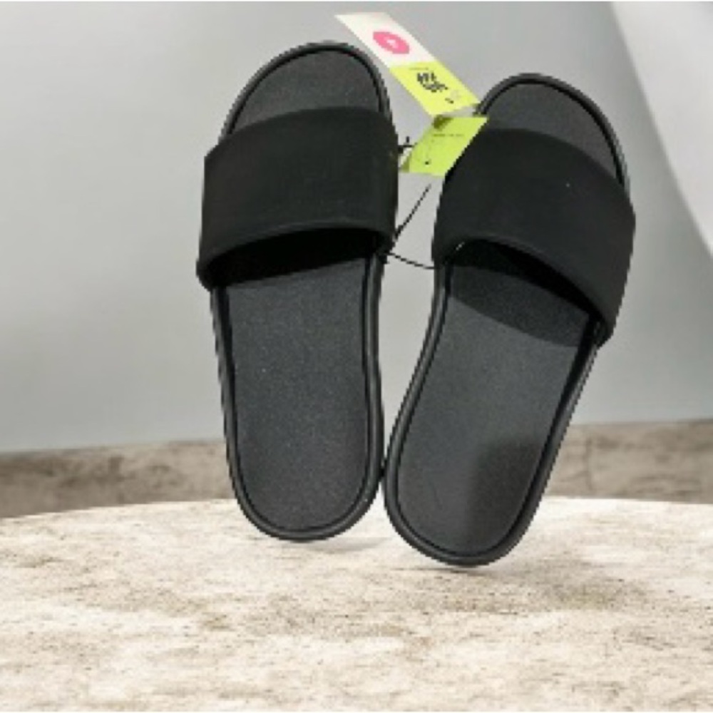 Buy one get one 50% off 
Cat & Jack Black Kids Slide Sandals